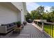 Outdoor back deck with stylish seating and grill, perfect for relaxing and entertaining at 125 Attena Way, Zebulon, NC 27597