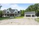 Beautifully constructed modern farmhouse with a detached two-car garage at 125 Attena Way, Zebulon, NC 27597