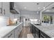 Modern kitchen featuring stainless steel appliances, granite countertops and ample cabinet space at 125 Attena Way, Zebulon, NC 27597