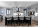 Modern kitchen with grey cabinets, stainless appliances, subway tile and a large island with seating at 125 Attena Way, Zebulon, NC 27597