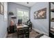 A cozy home office provides ample space for work and study with natural lighting at 125 Attena Way, Zebulon, NC 27597
