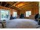 Large unfinished room with abundant natural light, presenting a blank canvas for customization and expansion at 125 Attena Way, Zebulon, NC 27597