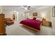 Spacious bedroom features a ceiling fan and a platform bed with built-in bedside tables at 1311 Norton St, Durham, NC 27701