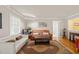 Bright living room with hardwood floors, neutral walls, and comfortable seating arrangement at 1311 Norton St, Durham, NC 27701