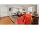 Cozy living room featuring hardwood floors, a large window, and comfortable couches at 1311 Norton St, Durham, NC 27701