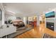 Spacious living room with hardwood floors, neutral paint, and an open layout to the kitchen at 1311 Norton St, Durham, NC 27701
