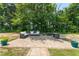 Enjoy a private patio with cozy seating, creating a relaxing outdoor retreat in the backyard at 1321 White Spruce Dr, Willow Springs, NC 27592