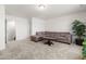 Finished basement area with comfortable seating, soft carpet, and recessed lighting at 1321 White Spruce Dr, Willow Springs, NC 27592
