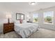 Comfortable bedroom with natural light, soft carpet, and classic decor at 1321 White Spruce Dr, Willow Springs, NC 27592