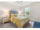 Comfortable bedroom with plush bedding, carpeted floor, and bedside tables with lamps at 1321 White Spruce Dr, Willow Springs, NC 27592