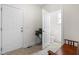 Mudroom entry featuring open doorway to the powder room with access to the exterior at 1321 White Spruce Dr, Willow Springs, NC 27592