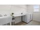 Functional laundry room equipped with modern appliances and a utility sink at 1321 White Spruce Dr, Willow Springs, NC 27592