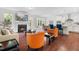 Open-concept living space with fireplace, kitchen, and dining area at 1321 White Spruce Dr, Willow Springs, NC 27592