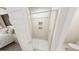 Modern bathroom showcasing a glass-enclosed shower with built-in niche, neutral tiles, and contemporary fixtures at 154 Beacon Dr, Pittsboro, NC 27312