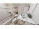 Fresh bathroom with shower and tub, white vanity, and modern fixtures at 154 Beacon Dr, Pittsboro, NC 27312