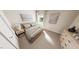 Neutral bedroom features a window with curtains, bedside table, and artwork at 154 Beacon Dr, Pittsboro, NC 27312