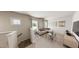 Upstairs living room featuring stylish furniture, carpet, and natural light at 154 Beacon Dr, Pittsboro, NC 27312