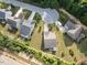 Aerial view of property showcasing landscaping and neighborhood at 1705 Bodwin Ln, Apex, NC 27502