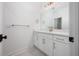 Bathroom featuring a white vanity with a marble countertop and bronze fixtures at 200 Whistlers Cv, Louisburg, NC 27549