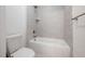 Bathroom featuring a tiled shower and tub combination at 200 Whistlers Cv, Louisburg, NC 27549