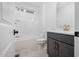 Bathroom featuring a tub, toilet, vanity and shower combo at 200 Whistlers Cv, Louisburg, NC 27549