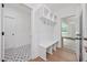 Mudroom with built-in bench, storage and coat hooks at 200 Whistlers Cv, Louisburg, NC 27549