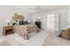 Comfortable bedroom featuring white walls, decorative headboard, and ample natural light at 204 Towne Ridge Ln, Chapel Hill, NC 27516
