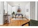 Inviting dining room features modern decor, stylish lighting, and comfortable seating for elegant meals at 204 Towne Ridge Ln, Chapel Hill, NC 27516