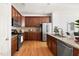 Spacious kitchen featuring stainless steel appliances, granite countertops, and ample cabinet space at 204 Towne Ridge Ln, Chapel Hill, NC 27516