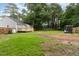 Large backyard with deck, storage shed and trailer at 204 Valley Ct, Selma, NC 27576
