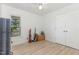 Bright bedroom with light wood flooring, a ceiling fan and a double-door closet at 204 Valley Ct, Selma, NC 27576