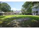 Spacious fenced back yard ideal for outdoor activities and entertaining, offering privacy at 205 Cedar Dr, Zebulon, NC 27597