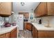 Practical kitchen layout with essential appliances and ample countertop space for meal preparation at 205 Cedar Dr, Zebulon, NC 27597