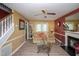 Cozy living room with a fireplace, hardwood floors, and comfortable seating at 205 Cedar Dr, Zebulon, NC 27597