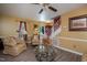 Relaxing living room with comfortable seating, neutral colored walls, and hardwood floors at 205 Cedar Dr, Zebulon, NC 27597