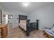 Bedroom showcasing wood floors, with access to a closet and reading nook at 206 Vandercroft Way, Bunnlevel, NC 28323