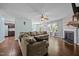 Inviting living room with a fireplace, hardwood floors, and comfortable seating, creating a warm and relaxing atmosphere at 206 Vandercroft Way, Bunnlevel, NC 28323
