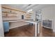 Spacious office with custom built-in desk, shelving, and ample storage, perfect for a home workspace at 206 Vandercroft Way, Bunnlevel, NC 28323