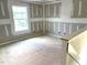Bright bonus room with large window, perfect for a playroom or home office at 21 Windflower Ct # Homesite 11, Clayton, NC 27520