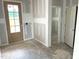 New home entryway featuring natural light, neutral colors and a view to other parts of the home at 21 Windflower Ct # Homesite 11, Clayton, NC 27520