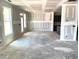 Bright open-concept living room featuring natural light and spacious design, perfect for entertaining and relaxation at 21 Windflower Ct # Homesite 11, Clayton, NC 27520