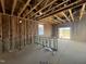 Unfinished interior featuring exterior wall insulation, offering a glimpse into the construction progress at 236 Norman Ave, Lillington, NC 27546