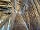 View of unfinished staircase, representing the home's interior development and future potential at 236 Norman Ave, Lillington, NC 27546