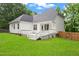 Spacious backyard with a well-maintained lawn and a charming two-story home is perfect for outdoor enjoyment at 2430 Josephine Rd, Garner, NC 27529
