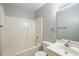 Functional bathroom features a standard tub and shower combination, toilet, sink, and vanity at 2430 Josephine Rd, Garner, NC 27529