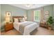 Comfortable bedroom with natural light, stylish decor, and a calm, inviting atmosphere at 2430 Josephine Rd, Garner, NC 27529