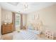 Cozy bedroom with playful decor, featuring neutral walls and a bright, airy atmosphere at 2430 Josephine Rd, Garner, NC 27529