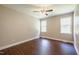 Bedroom with hardwood floors and large windows at 2430 Josephine Rd, Garner, NC 27529