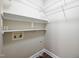 Walk-in closet features shelving and utilities at 2430 Josephine Rd, Garner, NC 27529