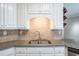 Close up of granite counters, undermount sink and tile backsplash at 2430 Josephine Rd, Garner, NC 27529